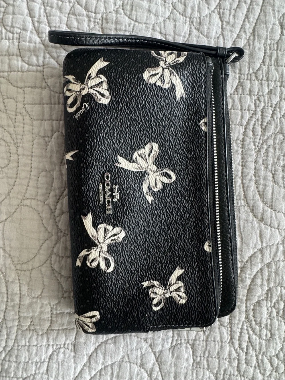 Coach Black Wristlet with White Bow Print